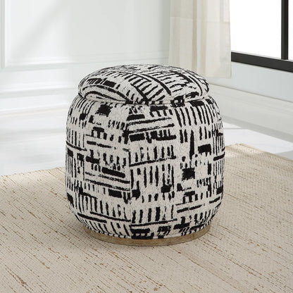 Dialogue Poof Ottoman by Uttermost in black. Made from hardwood, plywood, fabric, metal, foam in a eclectic & global style.