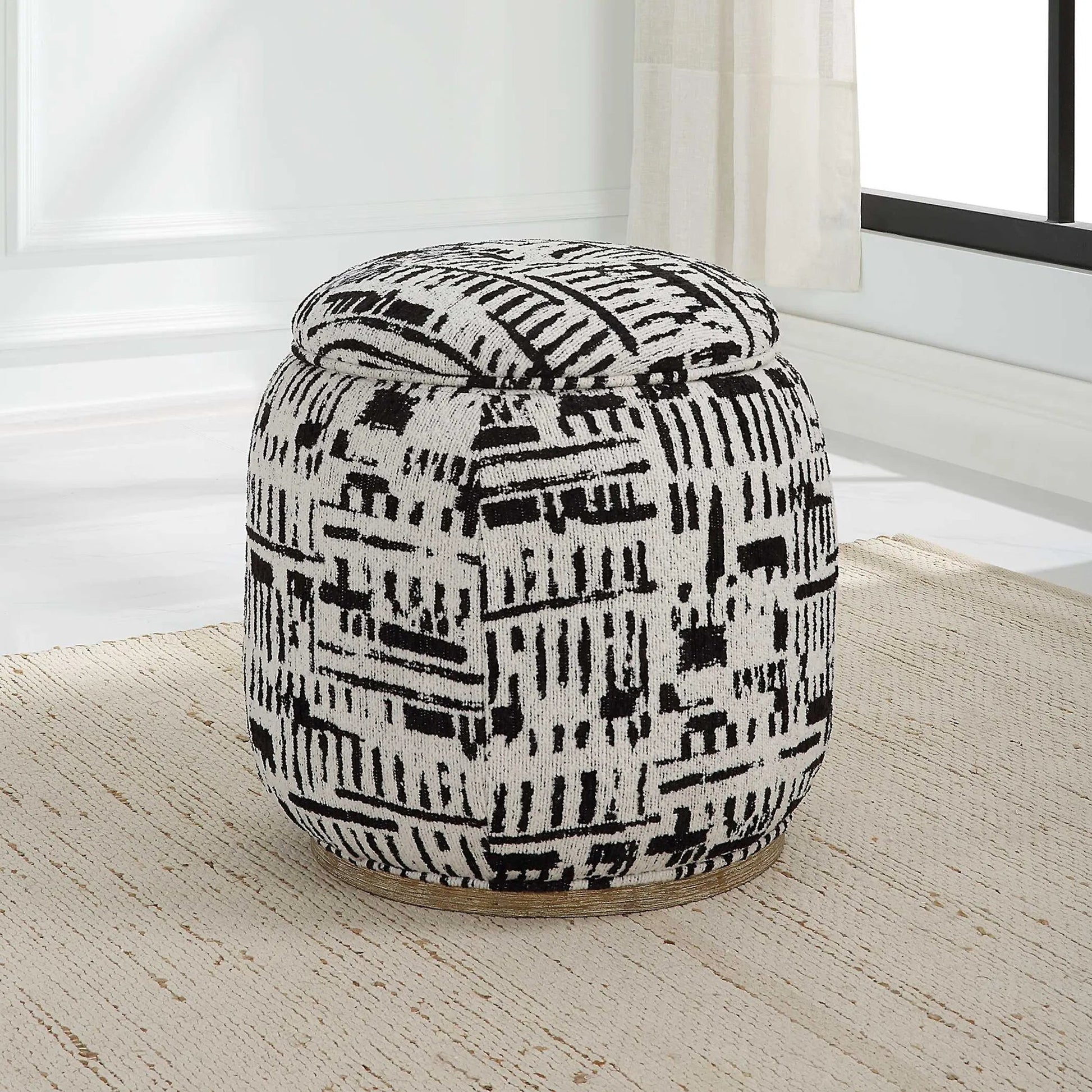 Dialogue Poof Ottoman by Uttermost in black. Made from hardwood, plywood, fabric, metal, foam in a eclectic & global style.
