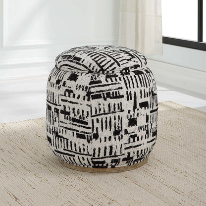 Dialogue Poof Ottoman by Uttermost in black. Made from hardwood, plywood, fabric, metal, foam in a eclectic & global style.