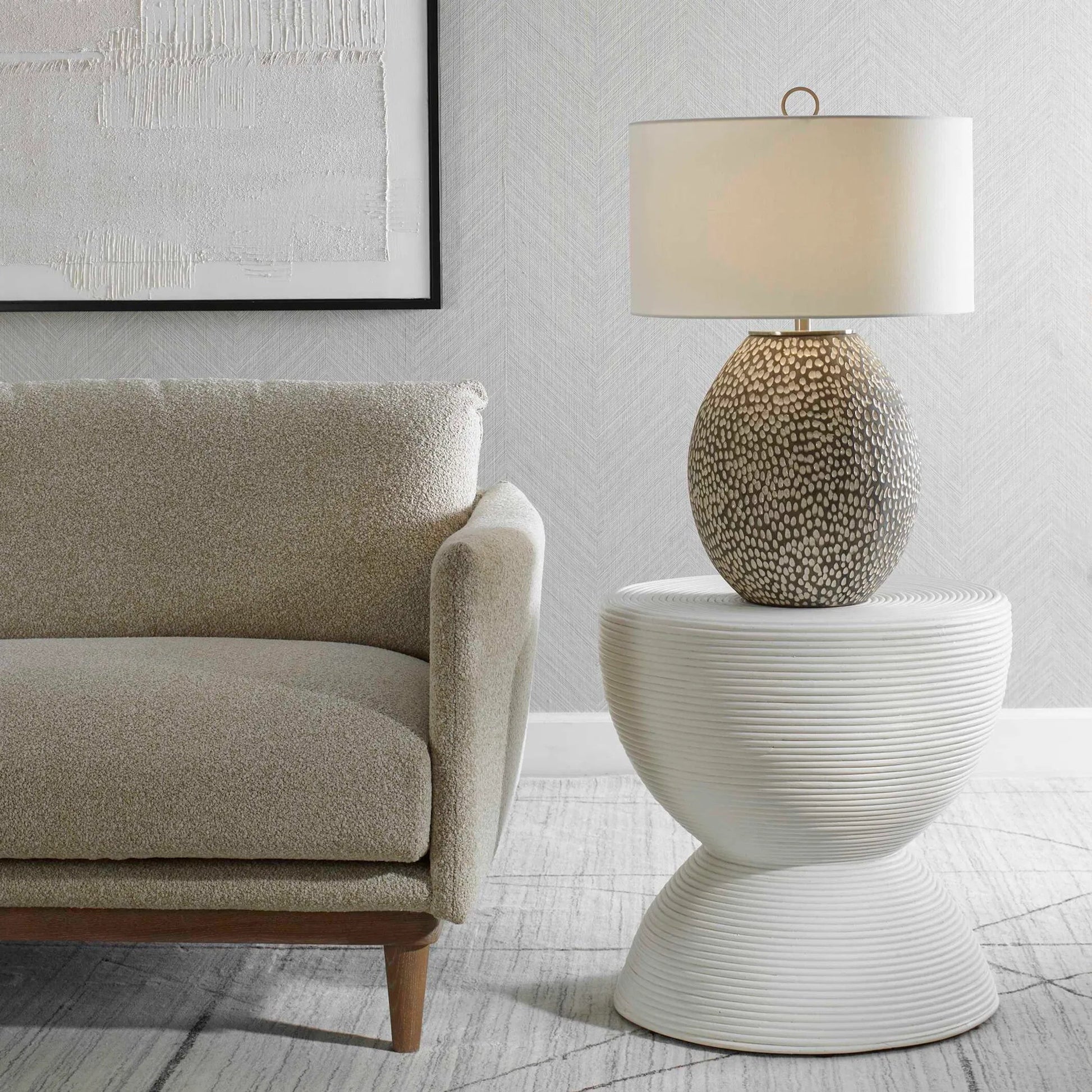 Bongo Rattan Side Table by Uttermost in white. Made from rattan pole with rattan core, fabric in a unique style.