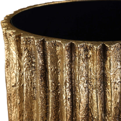 Echo Drink Table by Uttermost in gold. Made from resin, glass in a unique style.