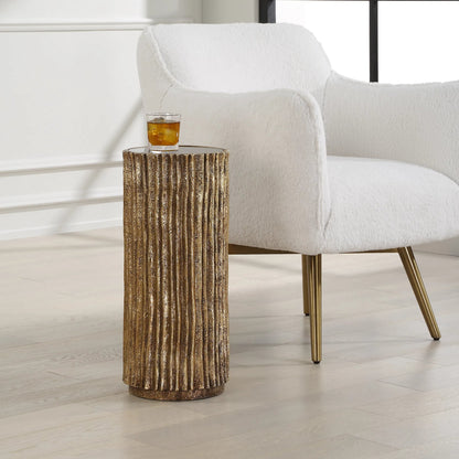 Echo Drink Table by Uttermost in gold. Made from resin, glass in a unique style.