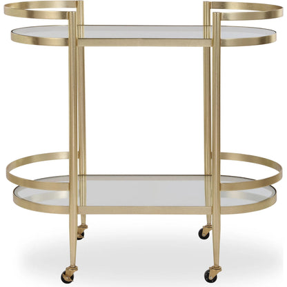 Isabelle Bar Cart by Uttermost in gold leaf. Made from iron, tempered glass in a transitional style.