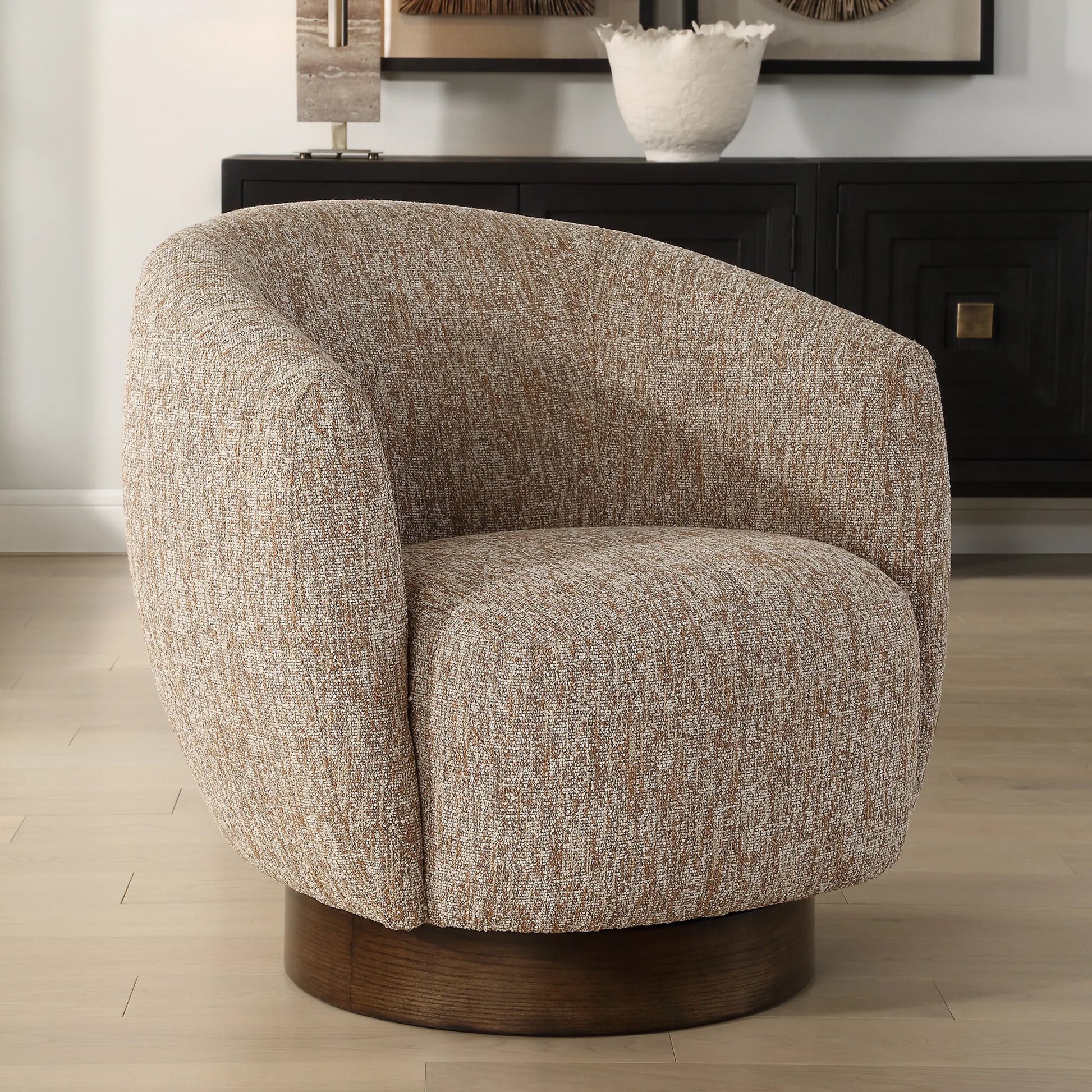 Dunes Fabric Swivel Chair by Uttermost in dark. Made from oak, plywood, foam, fabric in a transitional style.