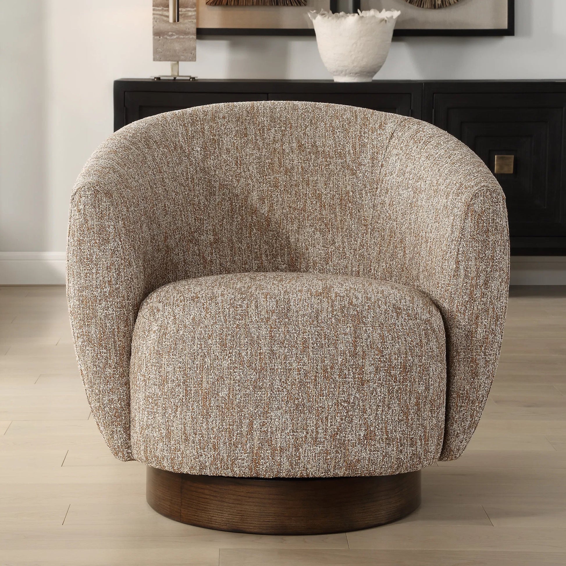 Dunes Fabric Swivel Chair by Uttermost in dark. Made from oak, plywood, foam, fabric in a transitional style.