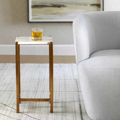 Affinity Accent Table by Uttermost in gold. Made from aluminum, marble in a modern style.