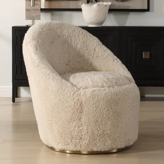 Crue Sheepskin Swivel Chair by Uttermost in brass. Made from plywood, hardwood, faabric, foam in a transitional style.