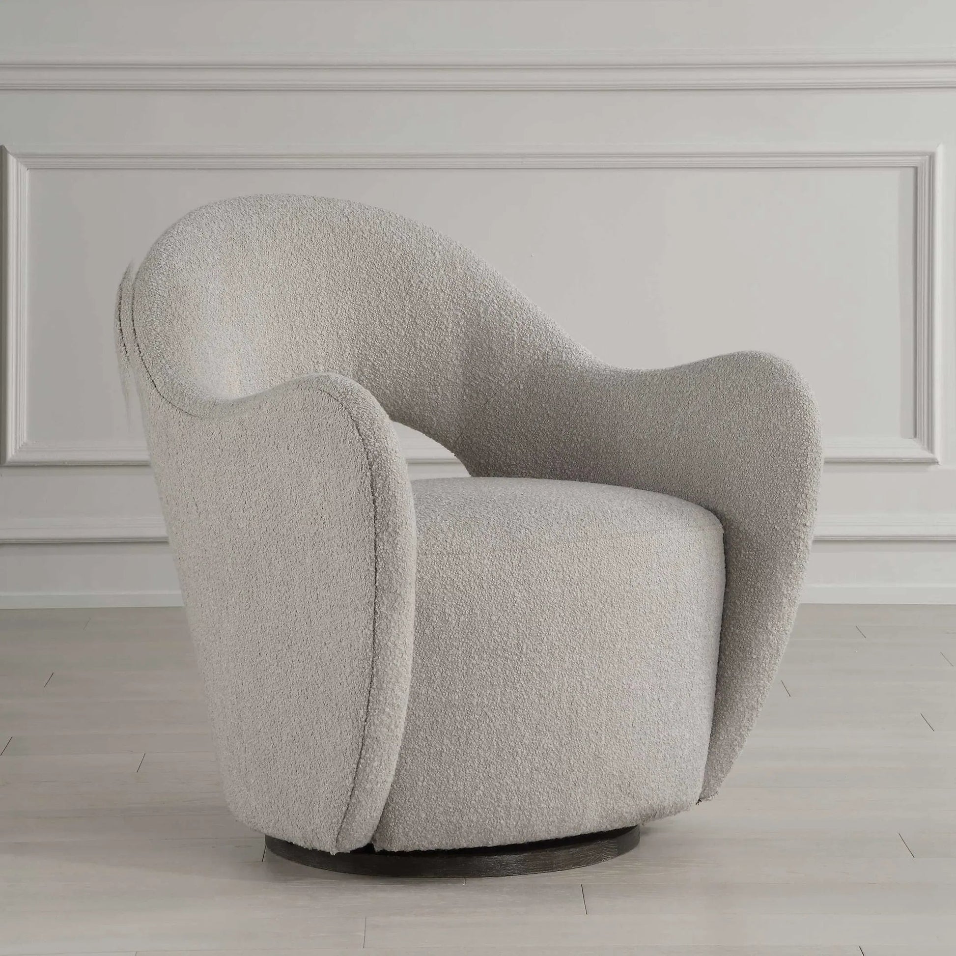 Wander Swivel Chair by Uttermost in oat and dark walnut. Made from bent wood, hardwood, fabric, foam in a unique style.
