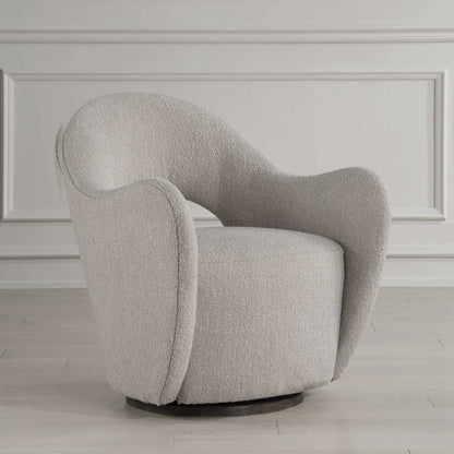Wander Swivel Chair by Uttermost in oat and dark walnut. Made from bent wood, hardwood, fabric, foam in a unique style.