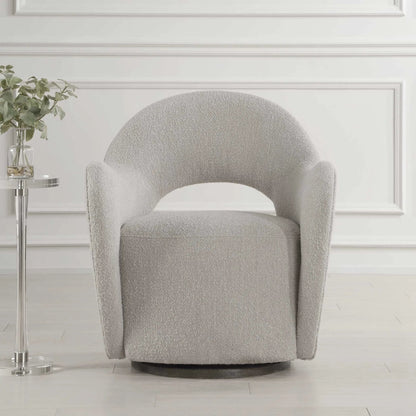 Wander Swivel Chair by Uttermost in oat and dark walnut. Made from bent wood, hardwood, fabric, foam in a unique style.
