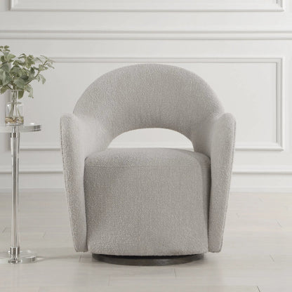 Wander Swivel Chair by Uttermost in oat and dark walnut. Made from bent wood, hardwood, fabric, foam in a unique style.