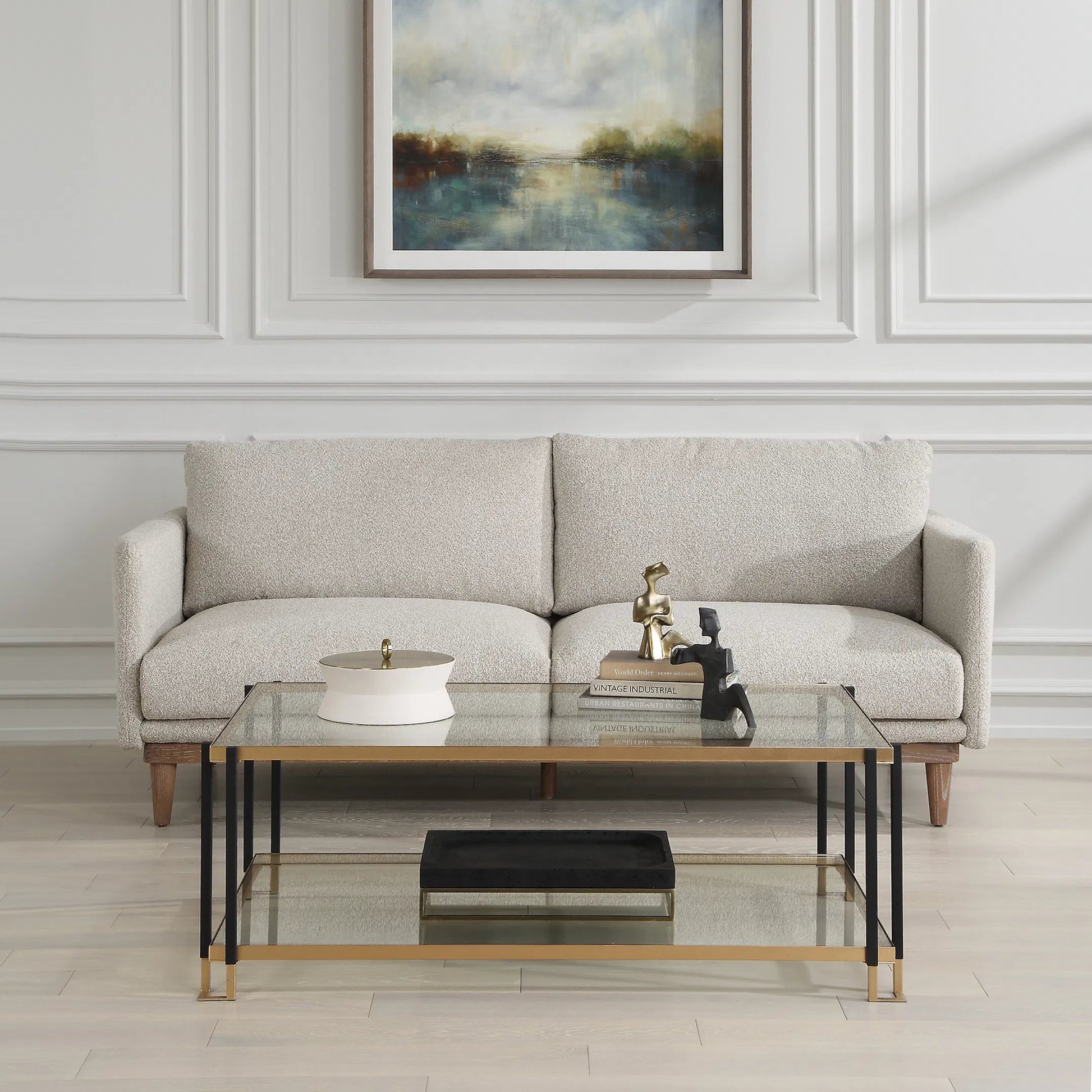 Kentmore Glass Coffee Table by Uttermost in gold leaf. Made from iron, tempered glass in a unique style.