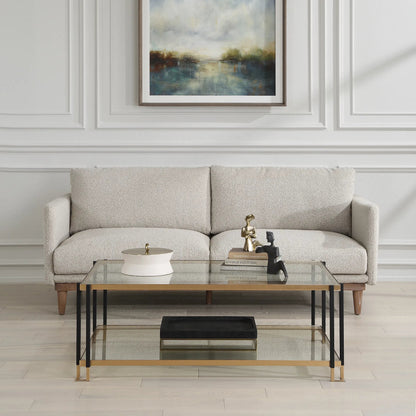 Kentmore Glass Coffee Table by Uttermost in gold leaf. Made from iron, tempered glass in a unique style.