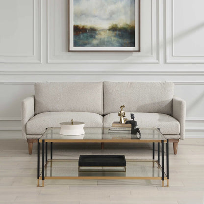 Kentmore Glass Coffee Table by Uttermost in gold leaf. Made from iron, tempered glass in a unique style.