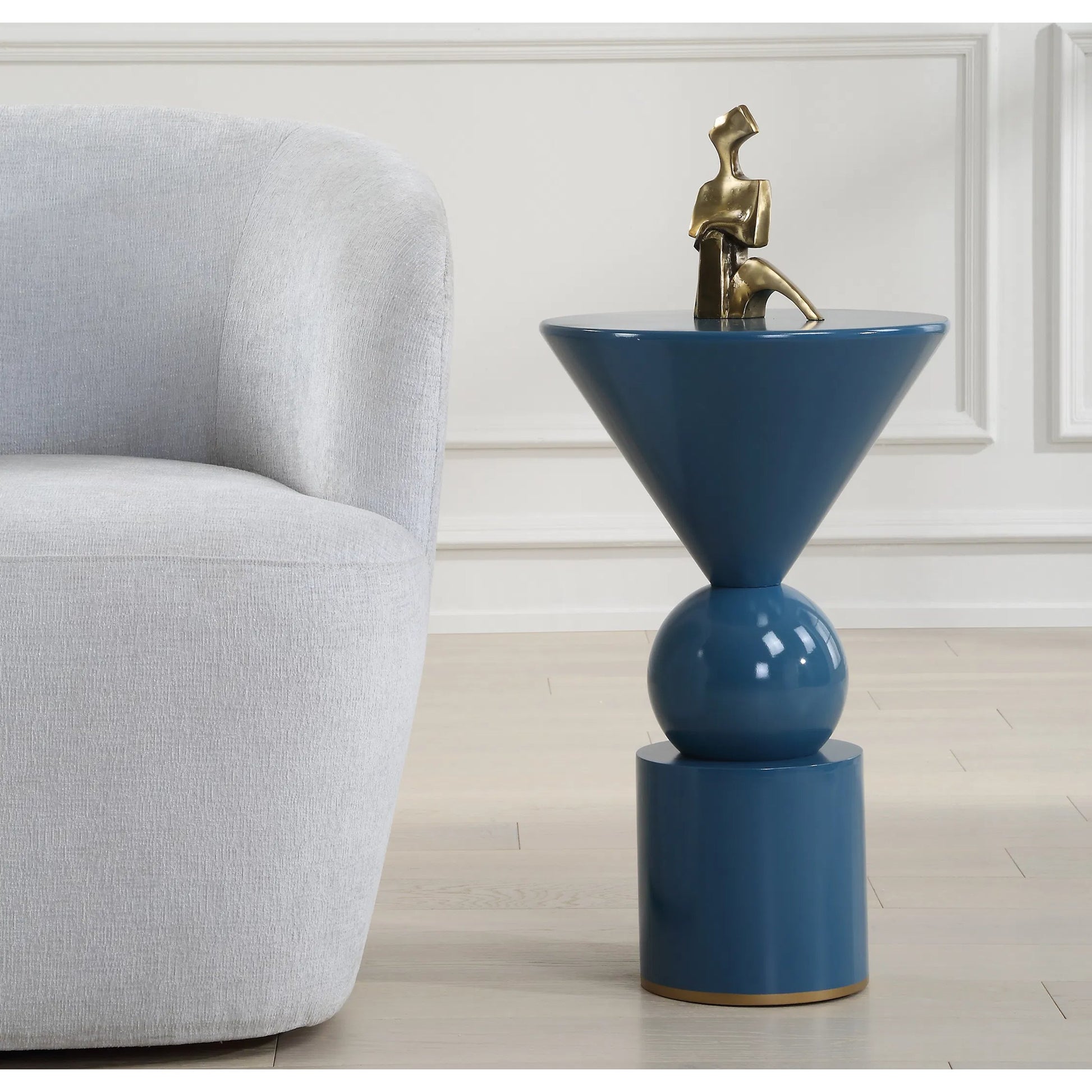 Trig Accent Table by Uttermost in gold. Made from iron, mdf in a eclectic & global style.