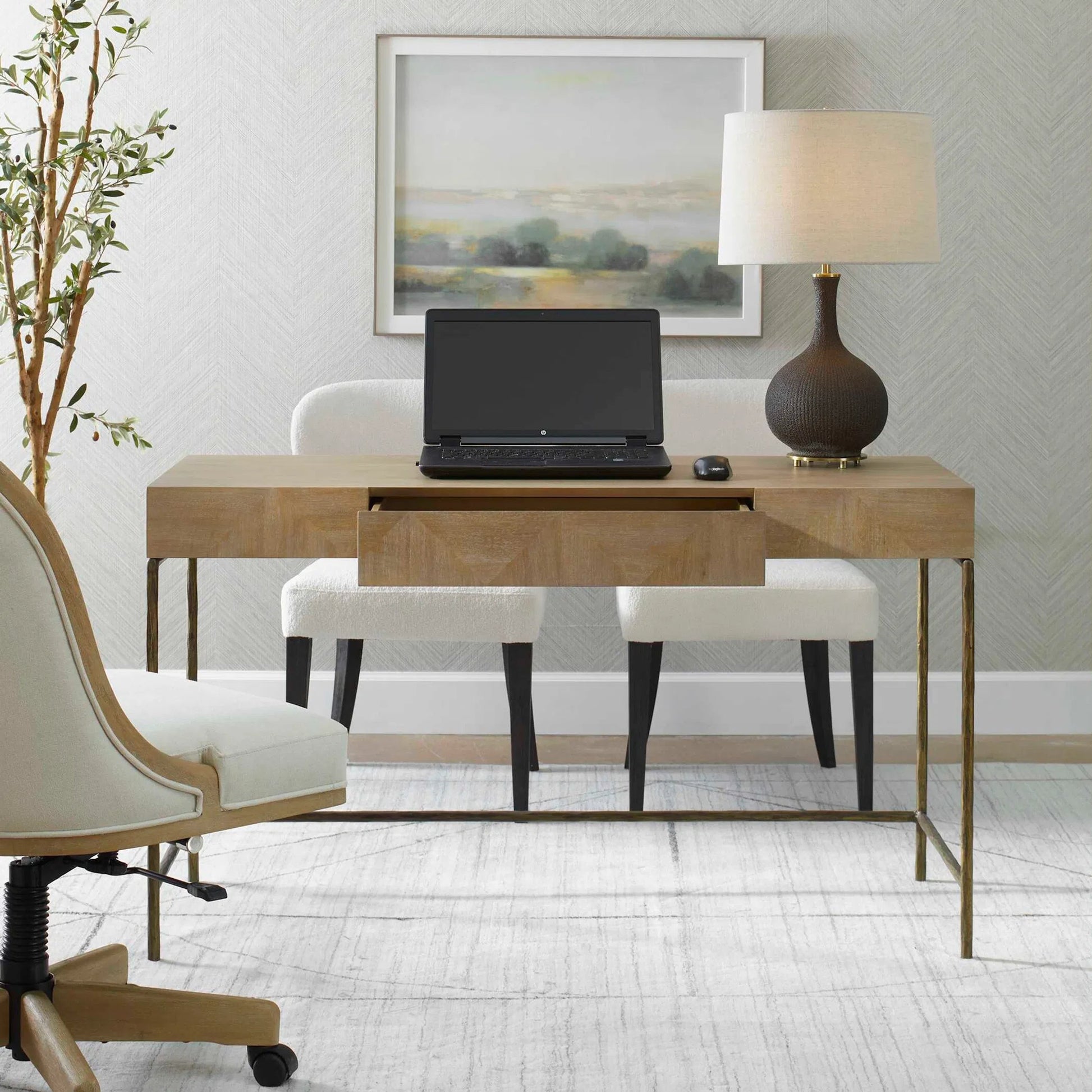 Aristotle Natuiral Modern Desk by Uttermost in gold. Made from cast iron, mdf, pramavera veneer in a transitional style.