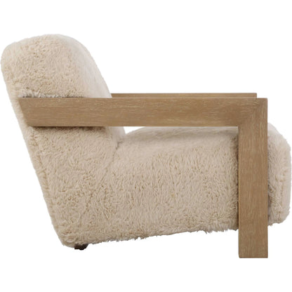 Jackson Sheepskin Accent Chair by Uttermost in oak. Made from plywood, rubber wood, foam, fabric in a transitional style.