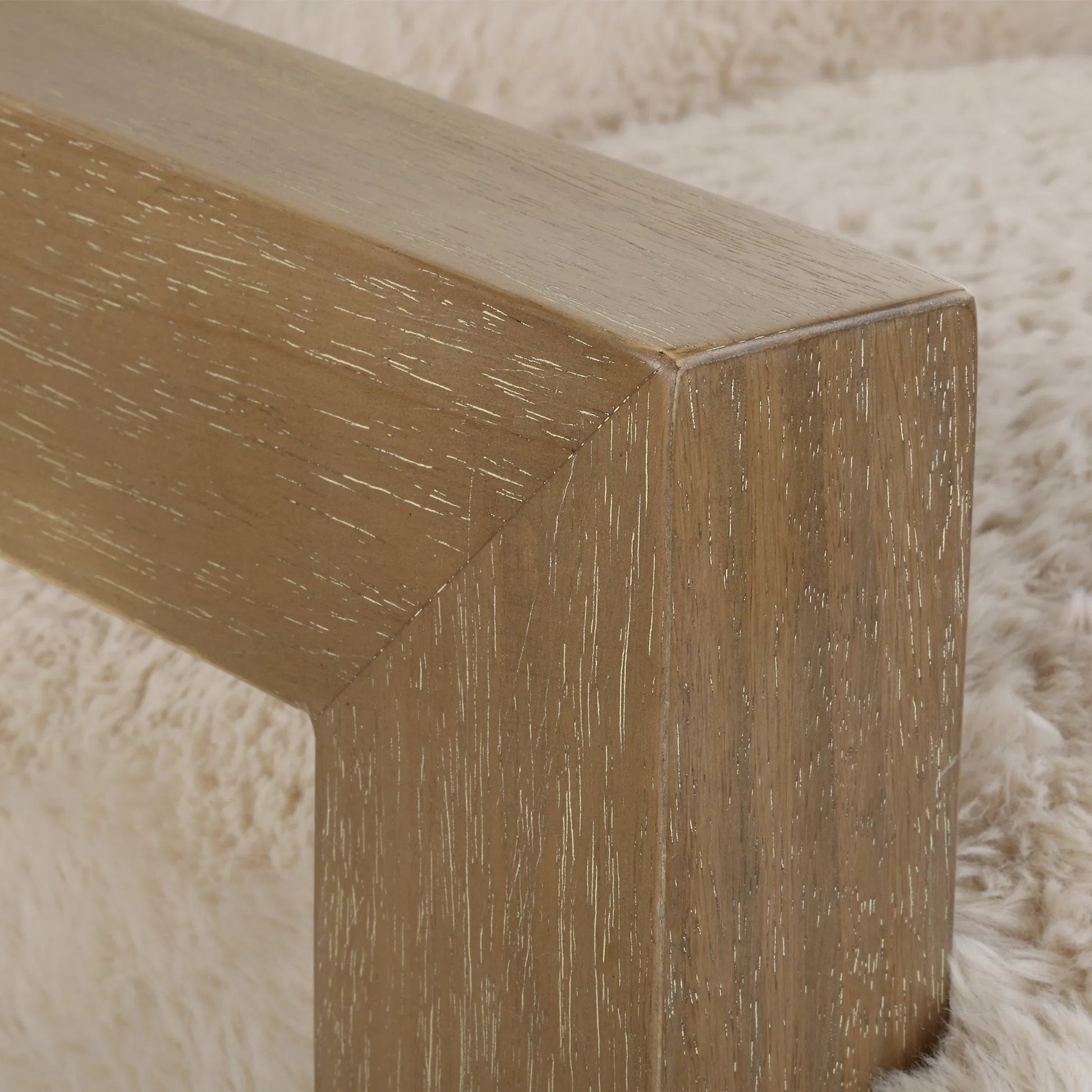 Jackson Sheepskin Accent Chair by Uttermost in oak. Made from plywood, rubber wood, foam, fabric in a transitional style.