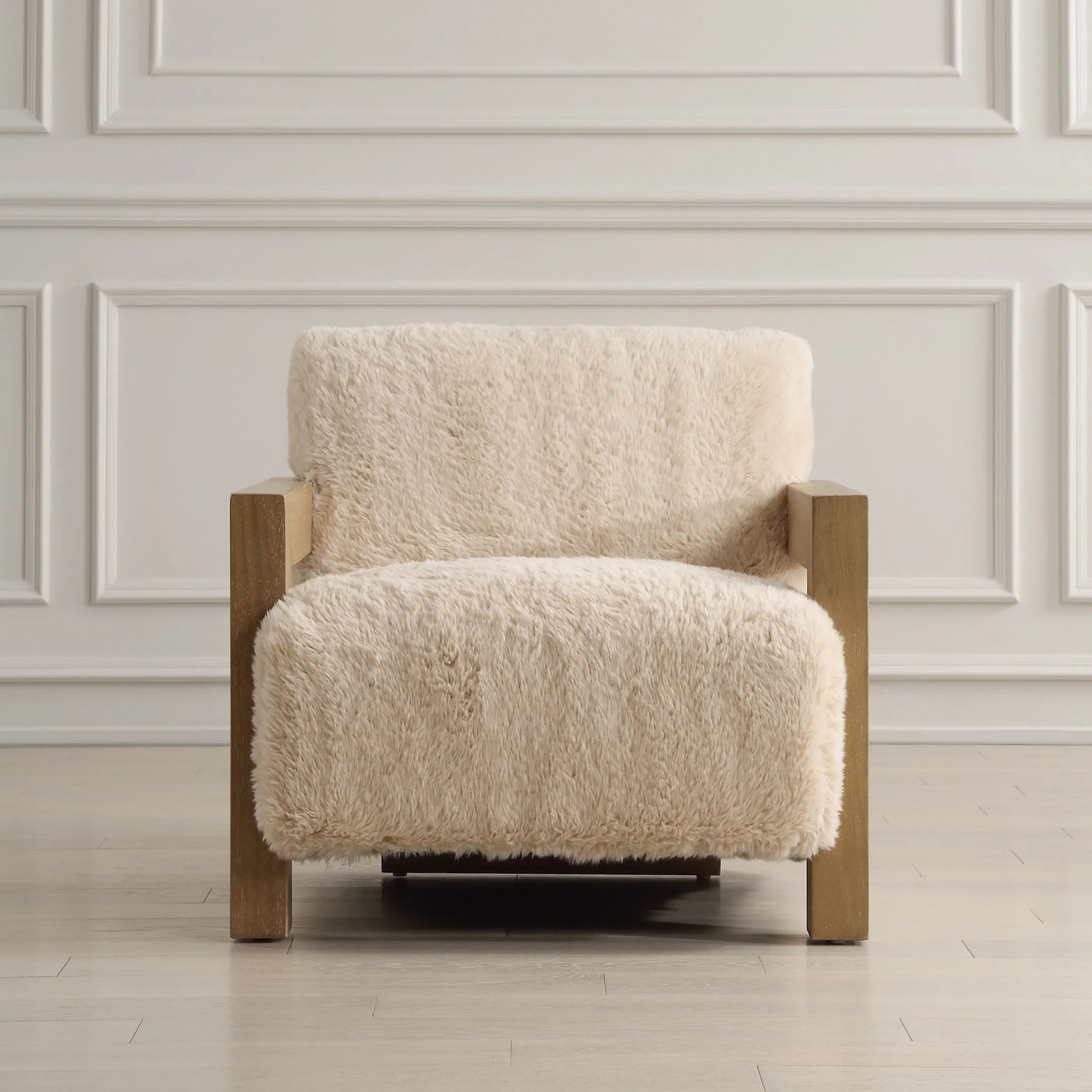 Jackson Sheepskin Accent Chair by Uttermost in oak. Made from plywood, rubber wood, foam, fabric in a transitional style.