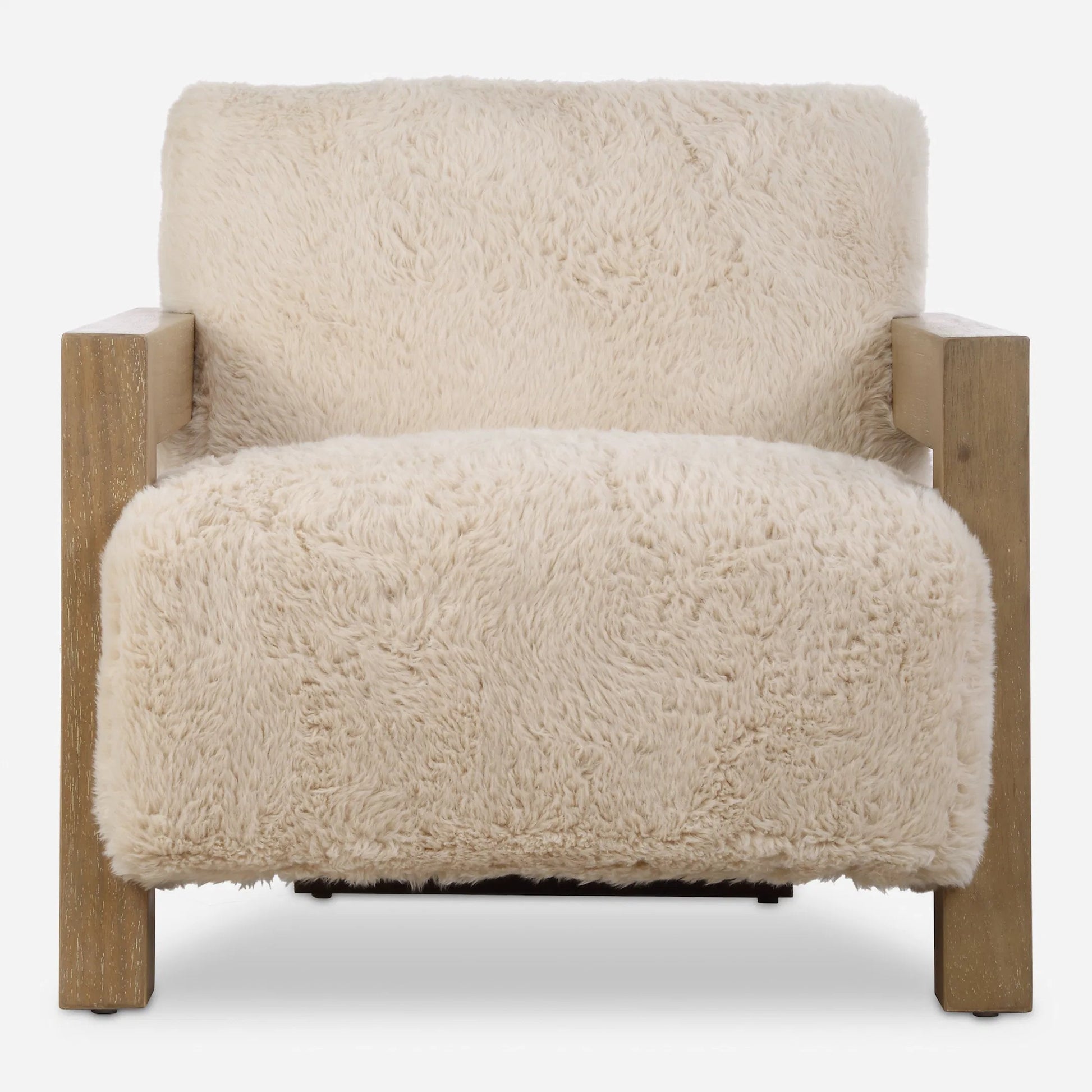 Jackson Sheepskin Accent Chair by Uttermost in oak. Made from plywood, rubber wood, foam, fabric in a transitional style.