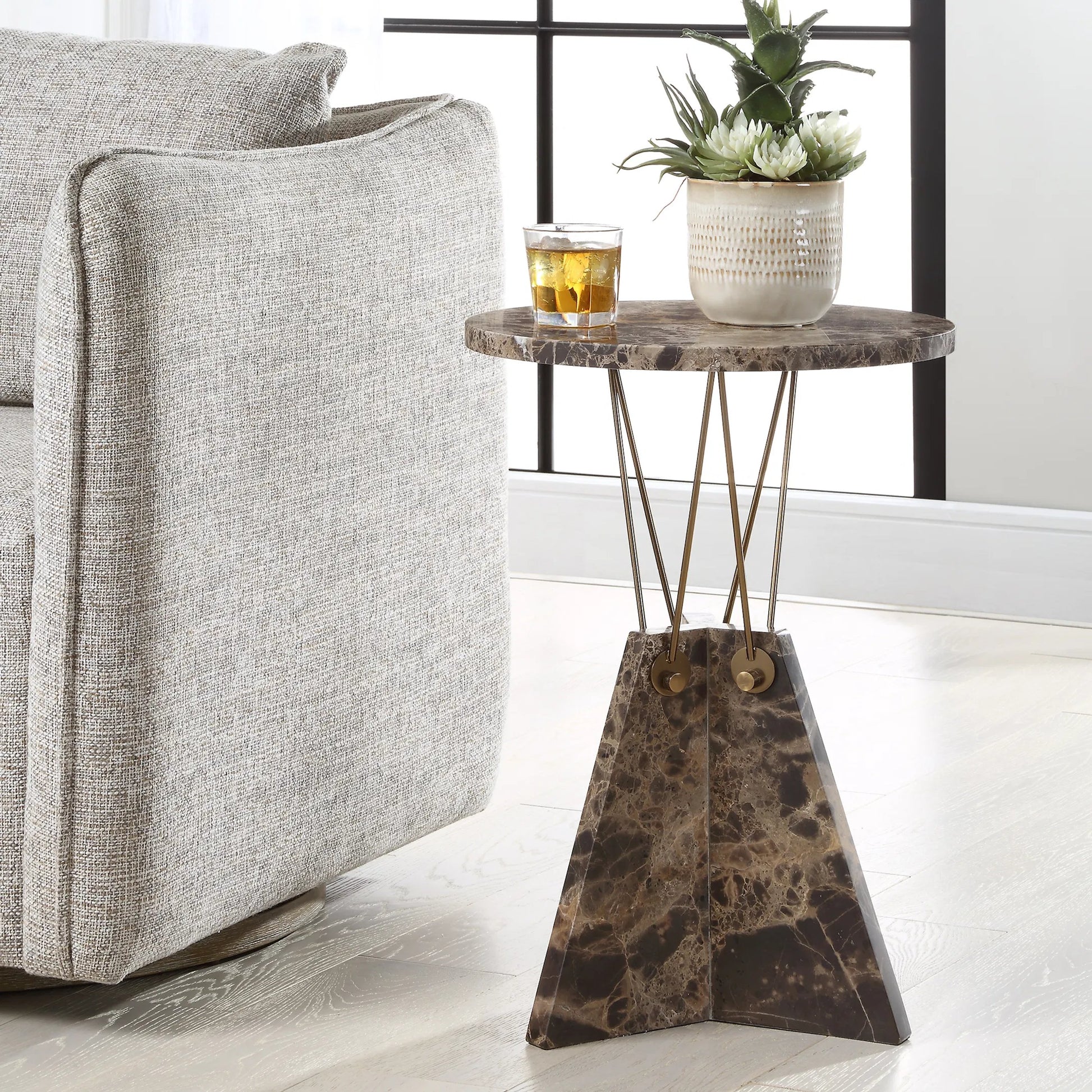Levitate Accent Table by Uttermost in brass. Made from marble, iron in a unique style.