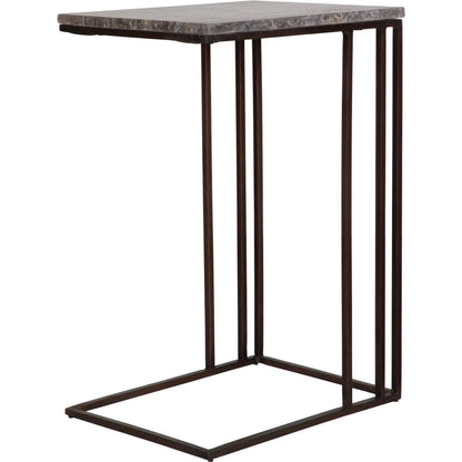 Theodore Travertine Accent Table by Uttermost in dark bronze. Made from marble, iron in a modern style.