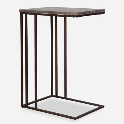 Theodore Travertine Accent Table by Uttermost in dark bronze. Made from marble, iron in a modern style.