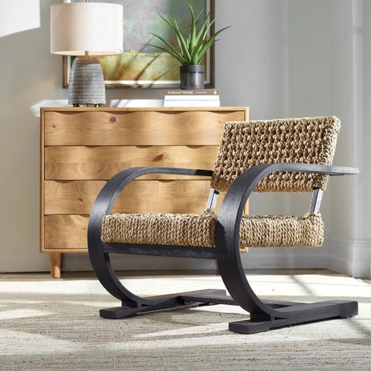 Rehema Accent Chair by Uttermost in black. Made from banana fiber, oak wood in a unique style.