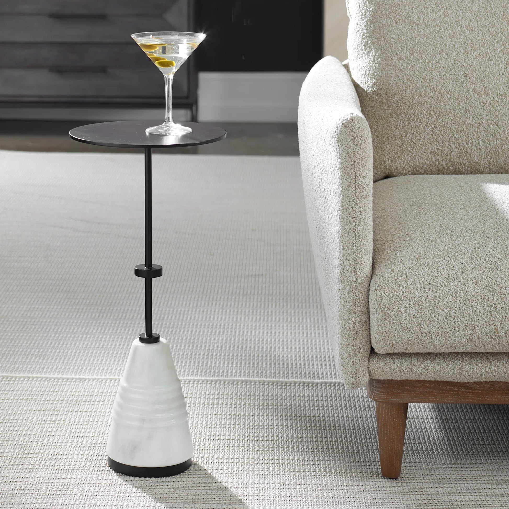 Kincaid Drink Table by Uttermost in black. Made from iron, marble in a unique style.