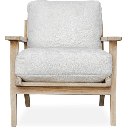 Laid Back Sheepskin Accent Chair by Uttermost in white. Made from mindi wood, fabric bopep in a transitional style.