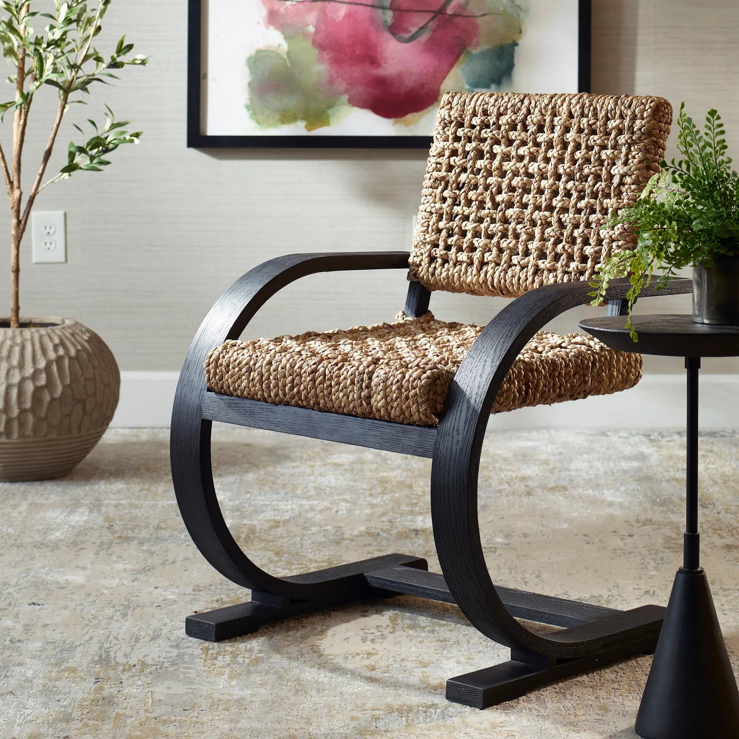 003 SI-2355262 | Lifestyle | Rehema Dining Chair by Uttermost in black. Made from oak wood in a rustic style.