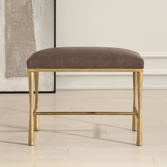 Reform Bench by Uttermost in gold. Made from iron, foam, mdf, pu leather in a unique style.