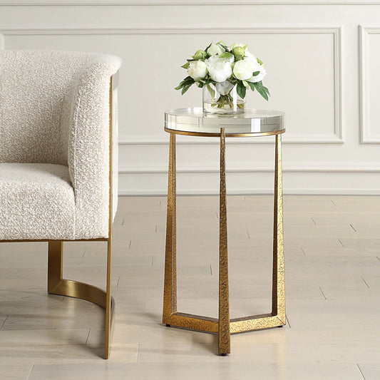 Midas Round Accent Table by Uttermost in gold. Made from iron, crystal in a transitional style.