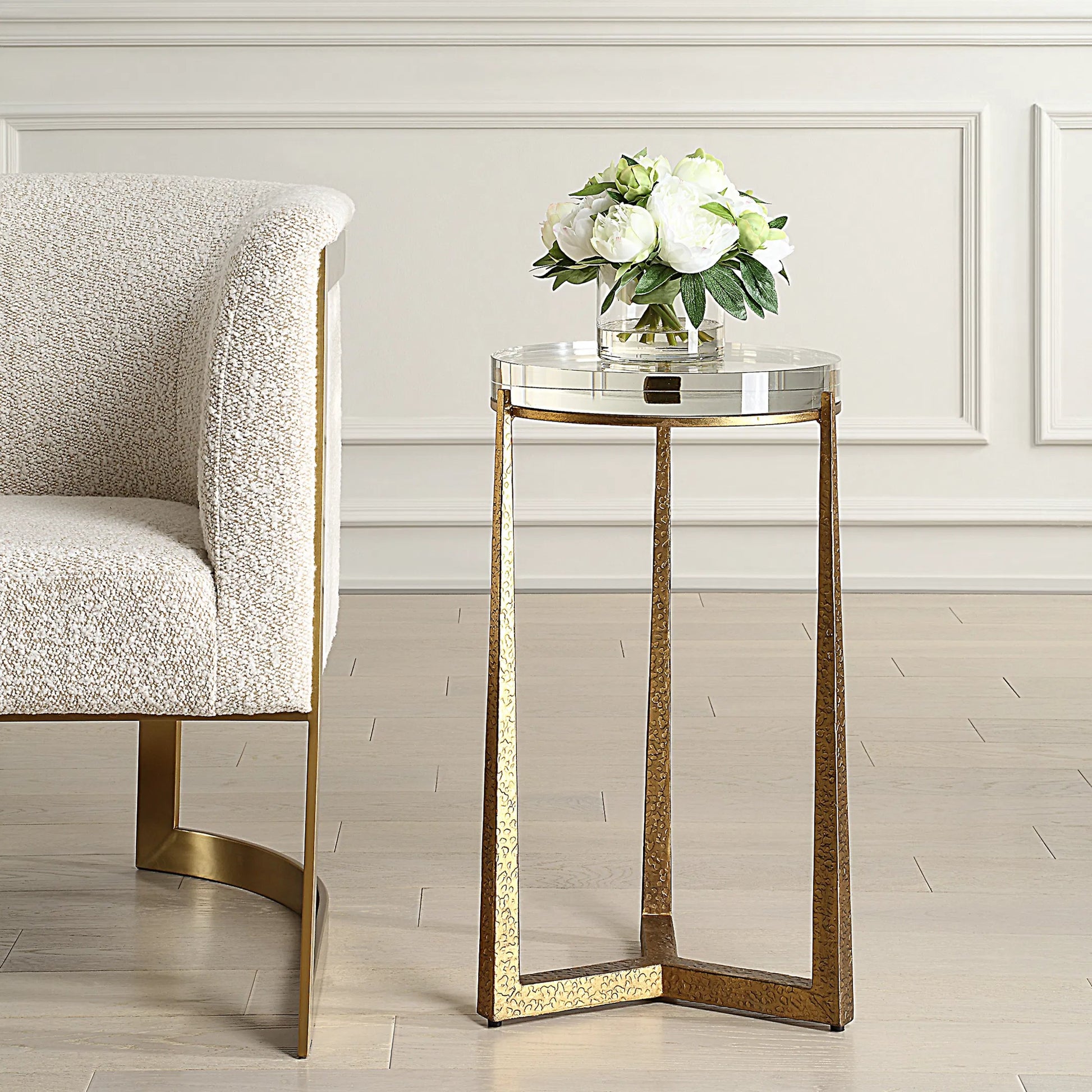 Midas Antique Accent Table by Uttermost in gold. Made from iron, crystal in a unique style.