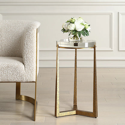 Midas Antique Accent Table by Uttermost in gold. Made from iron, crystal in a unique style.