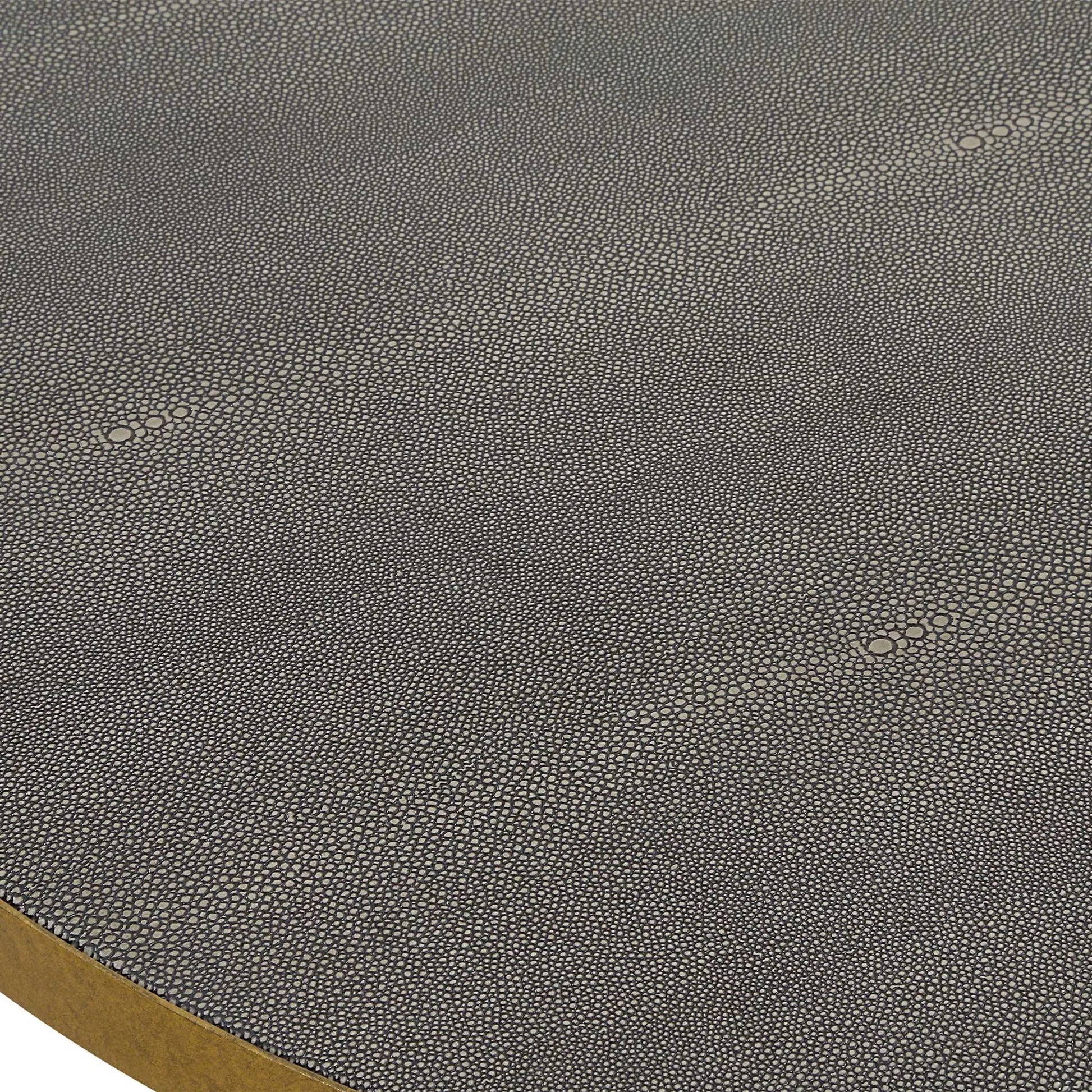 Aragon Nesting Coffee Tables by Uttermost in brass. Made from pu leather, mdf, metal in a unique style.