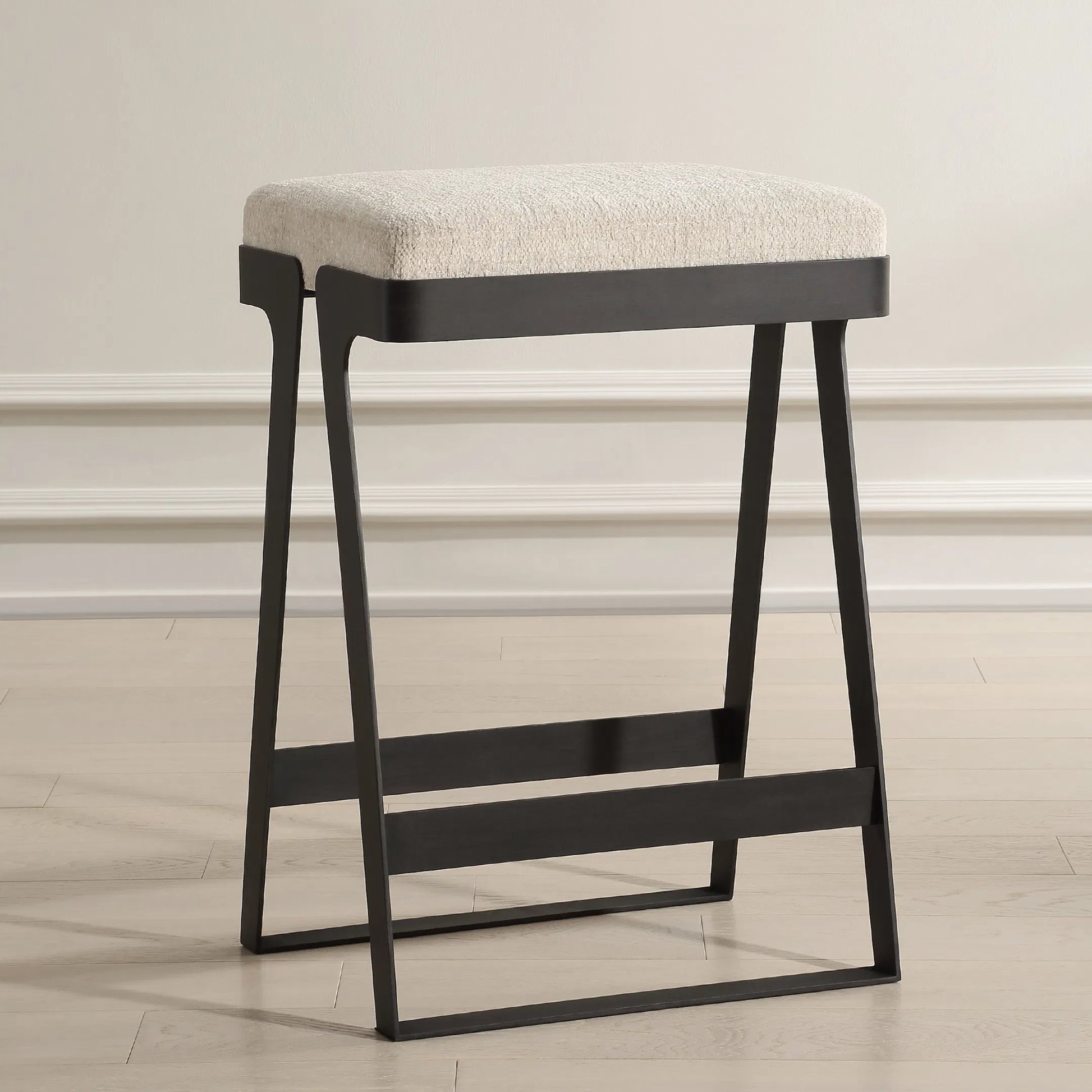 Hover Counter Stool by Uttermost in iron. Made from metal, mdf, foam, fabric in a unique style.