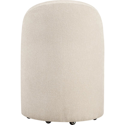 Roll with It Dining Chair by Uttermost. Made from fabric, foam, plywood in a transitional style.