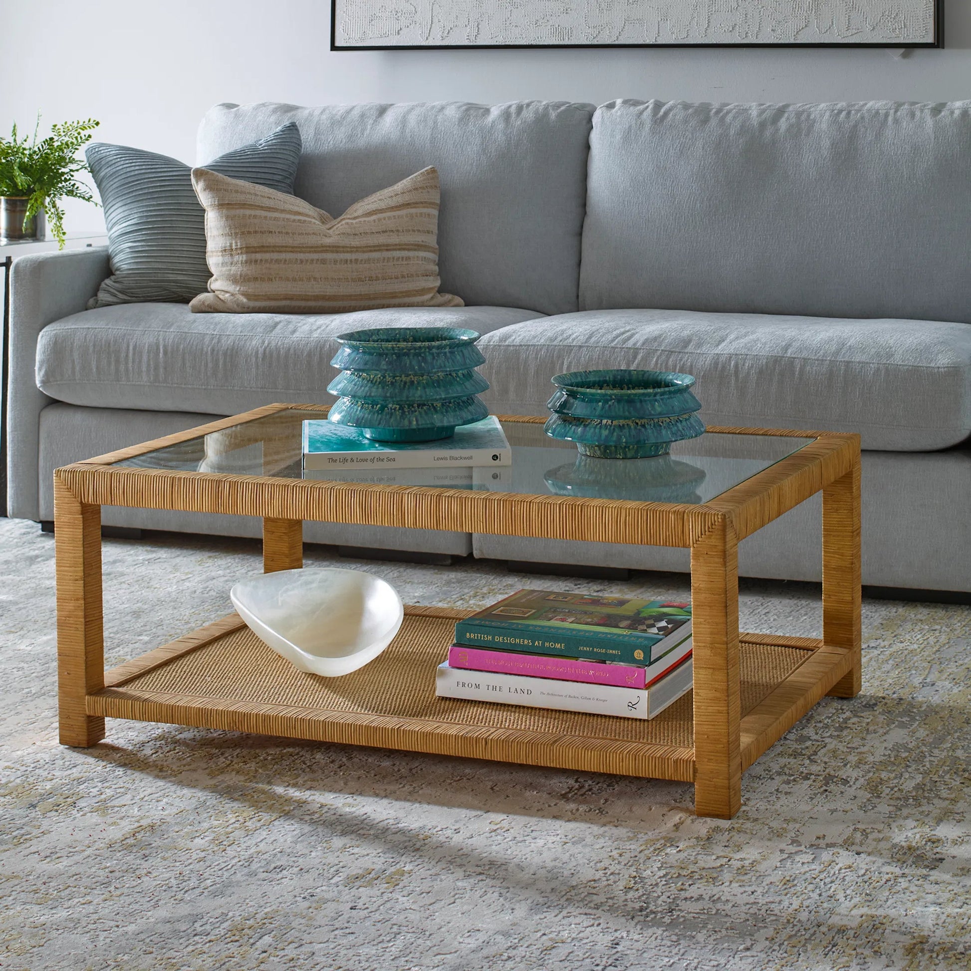 Kensing Natural Coffee Table by Uttermost in natural. Made from manggo wood with rattan core in a unique style.