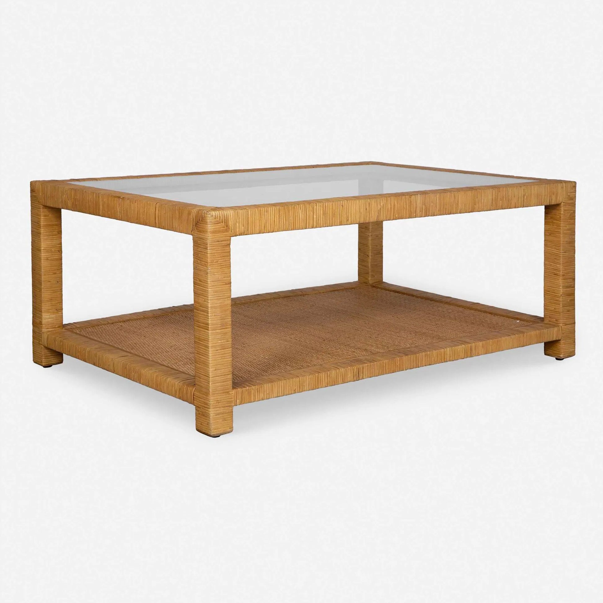 Kensing Natural Coffee Table by Uttermost in natural. Made from manggo wood with rattan core in a unique style.