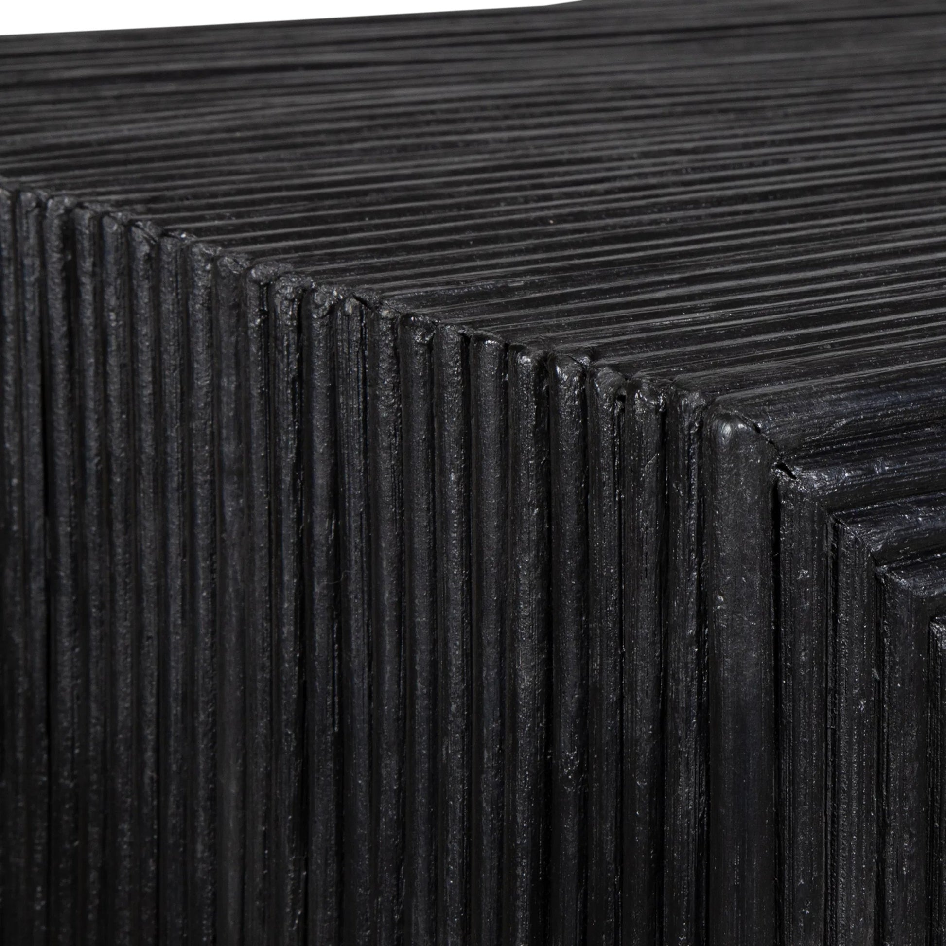 Compton Console Table by Uttermost in black. Made from rattan core, mahogani wood in a modern style.