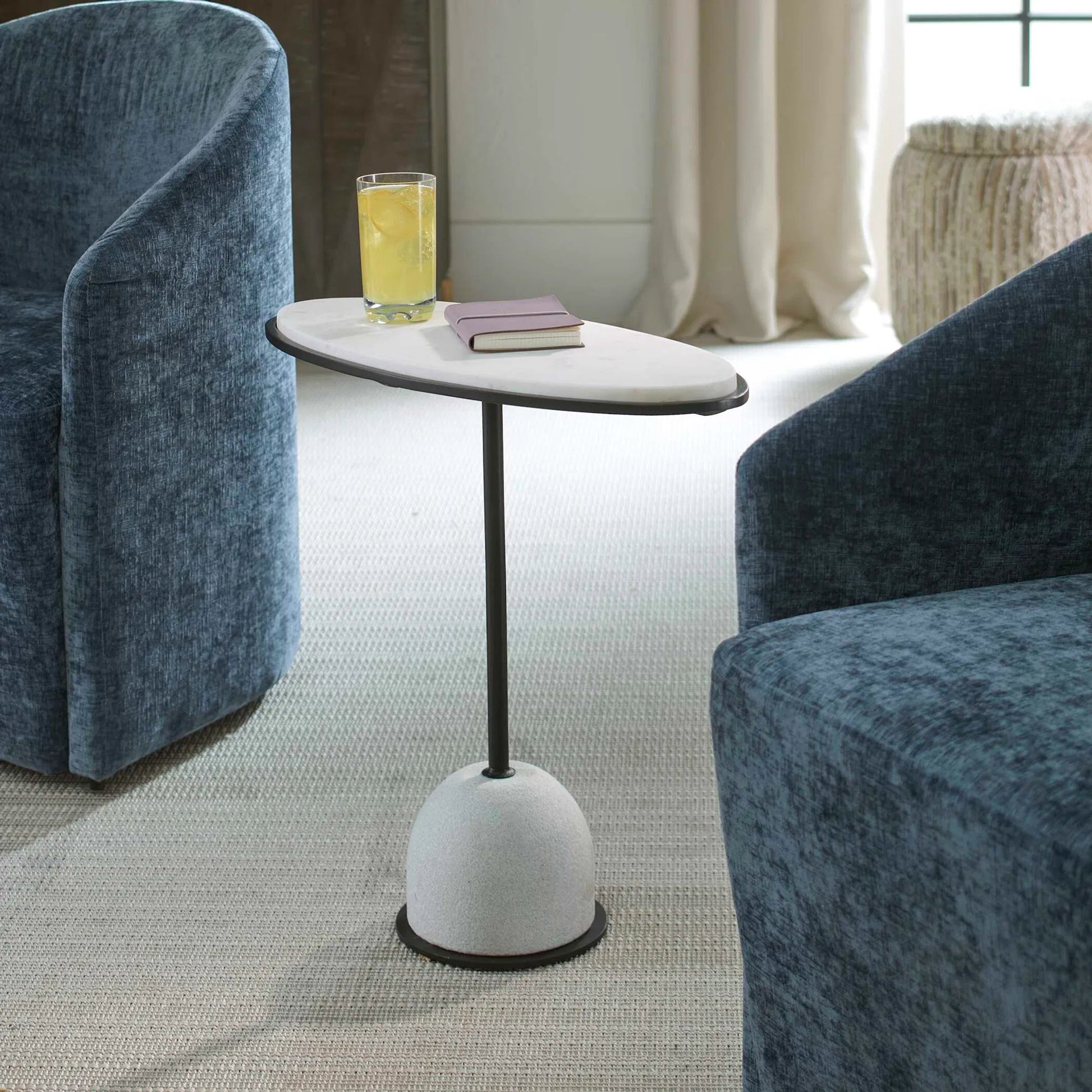 Morro Side Table by Uttermost in black. Made from marble, iron in a transitional style.