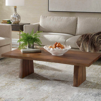 Glenmore Coffee Table by Uttermost in natural. Made from suar wood with metal kd in a transitional style.