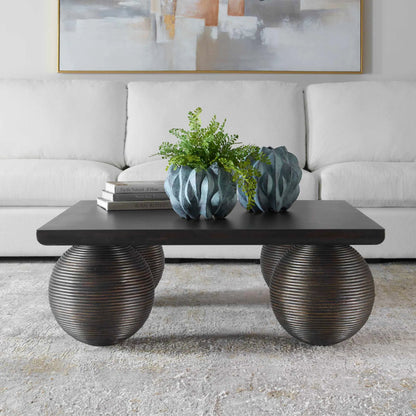 Kasson Sphere Leg Coffee Table by Uttermost in black. Made from mdf mango veneer, javamix wood in a unique style.