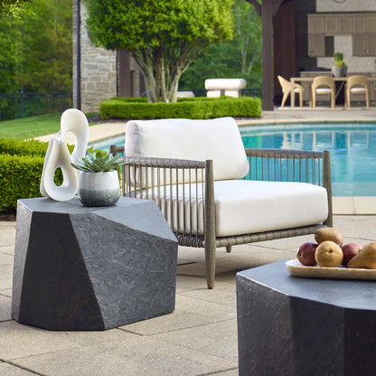 Parra Outdoor Side Table by Uttermost. Made from glass fiber reinforced concrete in a unique style.