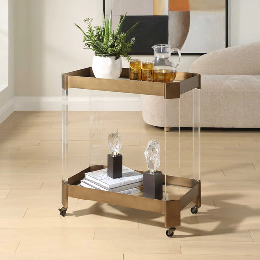 Giselle Bar Cart by Uttermost in bronze. Made from metal, tempered glass, acrylic in a unique style.