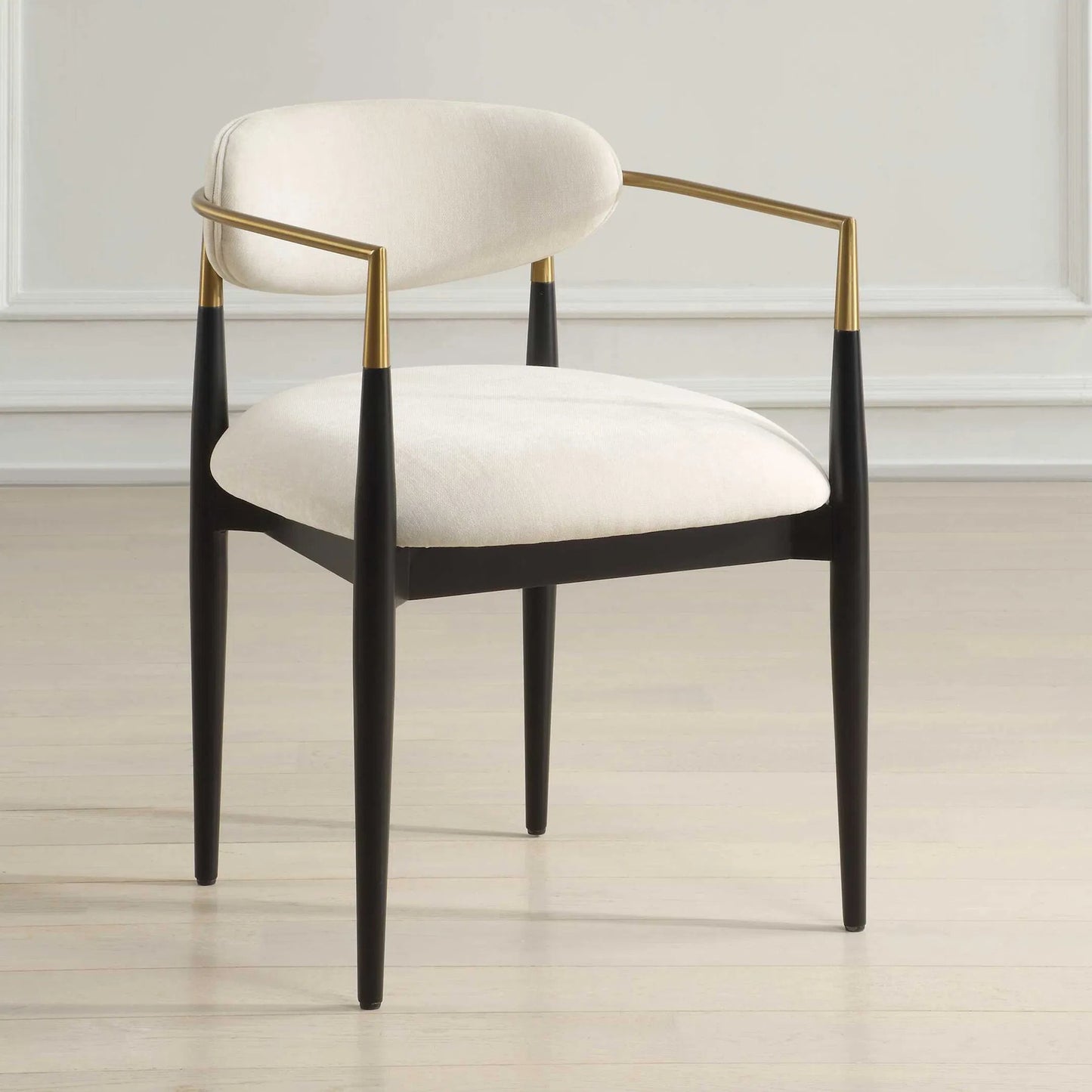 003 SI-2386663 | Lifestyle | Moxie Dining Arm Chair by Uttermost in off white, brass. Made from rubber wood, foam, fabric, iron, plywood in a modern style.