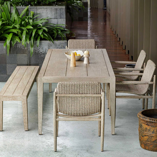 Sumba Wicker Outdoor Dining Chair by Uttermost in wheat. Made from mahogani wood, wicker in a unique style.