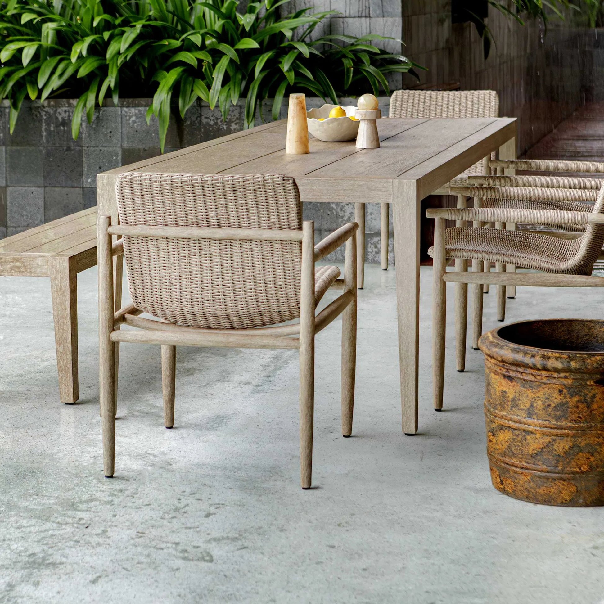 Kirkham Outdoor Dining Table by Uttermost in wheat. Made from mahogani wood in a transitional style.
