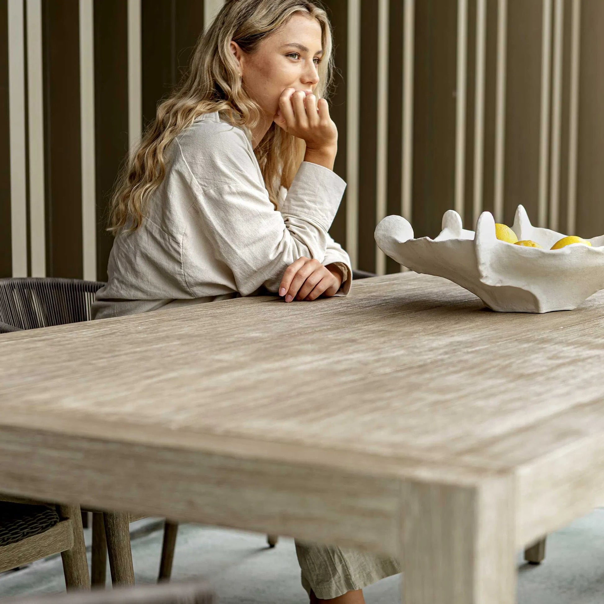 Kirkham Outdoor Dining Table by Uttermost in wheat. Made from mahogani wood in a transitional style.